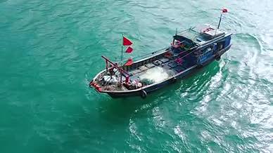 4k航拍三亚海上作业的渔民渔船风光视频的预览图